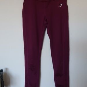 Gymshark leggings with pockets in Berry